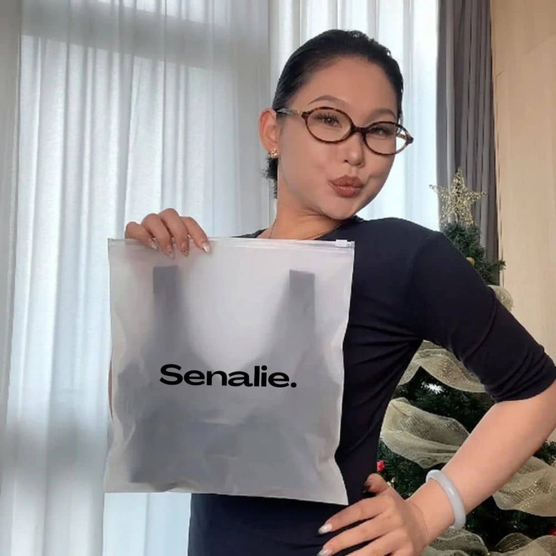 Woman holding her Senalie order